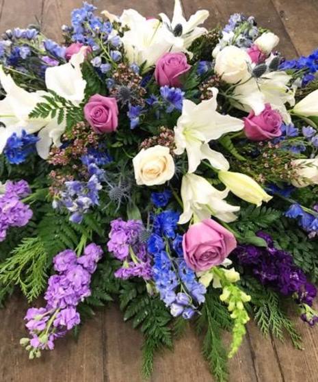 Lavender, Purple, White & Blue Casket Spray