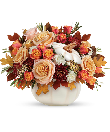 white lidded pumpkin container using autumn hues with roses, mums, yarrow and more